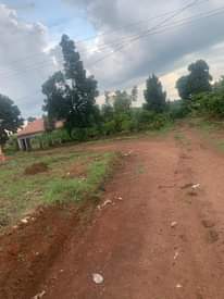 A picture of 50 130ft Wobulenzi Busula main road plot for sale Kampala