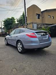 A picture of 2010 Honda Accord Crosstour Registered Android screen with BT rev