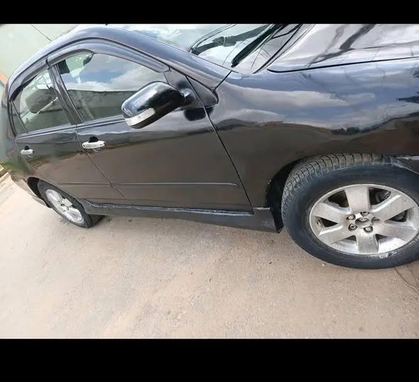 A picture of AWOOF DEALERS DEAL TOYOTA COROLLA 04