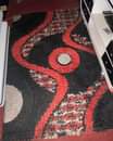A picture of Carpet n wooden sideboard