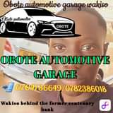 A picture of Obote automotive garage wakiso behind the former centenary bank contact
