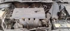 A picture of Manual Transmission Partially painted Toyota Corolla Engine and gear is