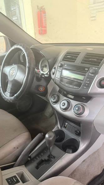 A picture of Sharp used Toyota rav409 for sale painted on first body