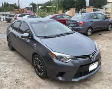 A picture of EXTREMELY SOUND PRE OWNED 2015 TOYOTA COROLLA LE SMOOTH DRIVE