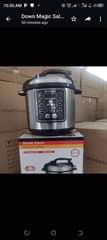 A picture of Air fryer pressure cooker and the speaker