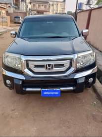 A picture of Honda Pilot 2010 model For sale my WhatsApp08064945586