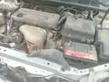 A picture of Toks Standard Firstbody 2004 Toyota clean interior and exterior engine