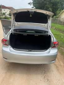 A picture of 8m with sambo 2013 Toyota Corolla on belt with untampered