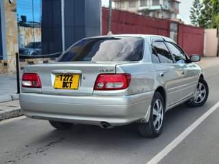 A picture of TOYOTA CARINA TI BEI MILIONI 7 8 MWENYEWE ANA SHIDA
