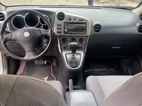 A picture of SHARP TOYOTA MATRIX 2004 MODEL HAS A PANO ROOF AT