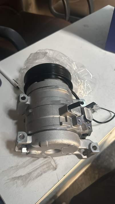 A picture of Used new car AC compressor