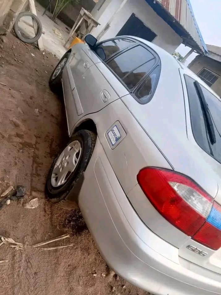 A picture of Fast fingers money needed asap Mazda 626 lift back tokunbo