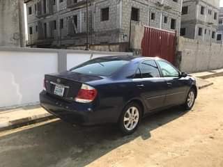 A picture of Pure First body Toyota Camry 2006 XLE V6 with a