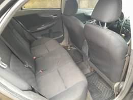 A picture of Toyota corolla nigeria used 2009 molde ac everything is working