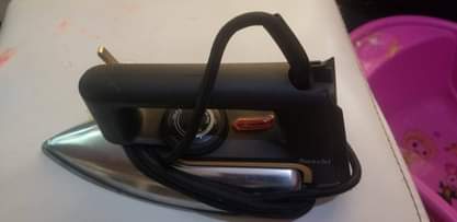 A picture of Wall fan at 70k saachi original flat iron 45k