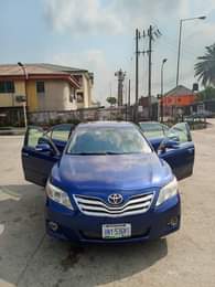 A picture of TOYOTA CAMRY LE 2011 MODEL FIRST USER AND BARELY DRIVEN