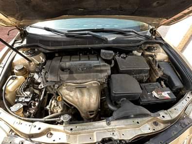 A picture of Sound Registered 2011 Camry with original android screen and Formica