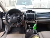A picture of FIRST BODY TOYOTA CAMRY 2013 IN GOOD WORKING CONDITION BUY