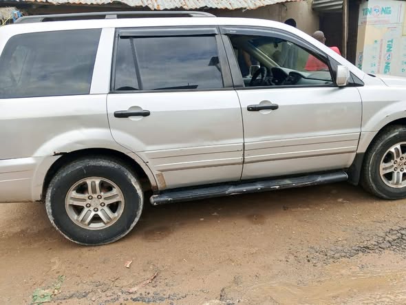 A picture of PURE FIRST BODY HONDA PILOT WITH GOOD ENGINE AND GEAR