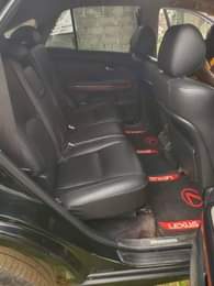 A picture of Lexus rx330 black with black interior Pure first body pan