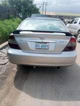 A picture of Toyota Camry 2004 4 plug Painted Engine gear and ac