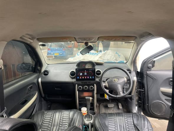 A picture of TOYOTA IST BLACK COLOUR YEAR 2004 FULL AC GARI HAINA