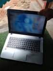 A picture of Asus laptop slim body comes with mouse