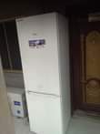 A picture of HP laptop Fridge and home theater