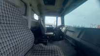 A picture of Foreign used man diesel truck 10 tyres with tunnel axel