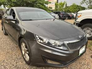 A picture of Distress very clean Kia Optima 2014 model with everything intact