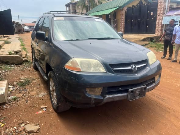 A picture of 100 First body registered 2003 Acura MDX
