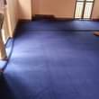A picture of Wall to wall wollen carpets