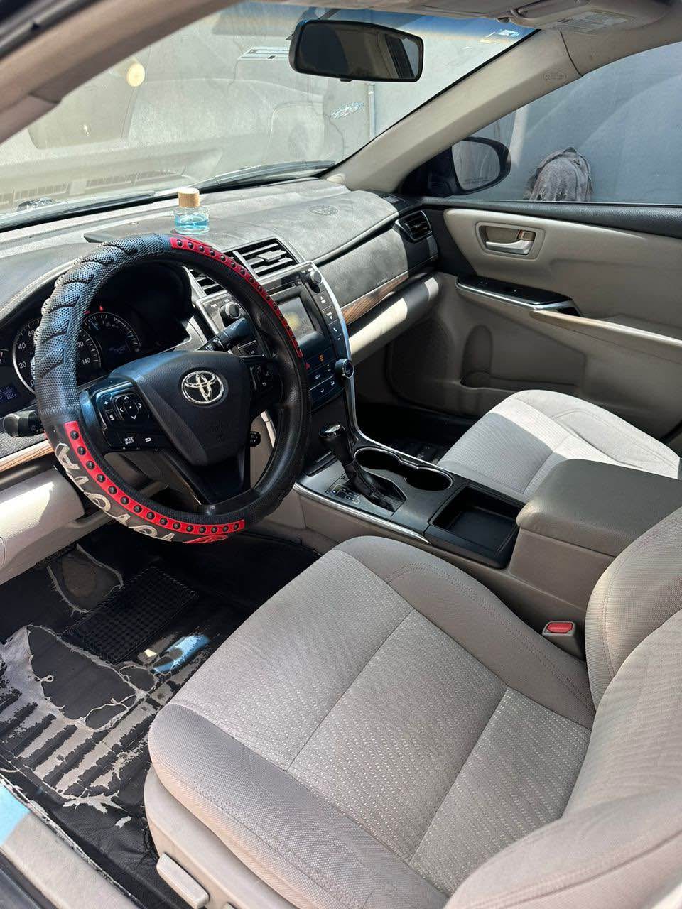 A picture of Toyota Camry 2015 model. No single fault. Price 10.5m .