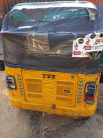 A picture of Tvs tricycle
