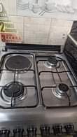 A picture of blue flame 1 electric plate 3 gass and electric oven