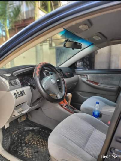 A picture of Mad Distress ooo 2007 Toyota Corolla LE with super sharp