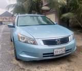 A picture of 4 plugs Honda Accord 2010 model