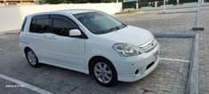 A picture of White Toyota Raum For Sale