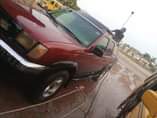 A picture of Nissan Frontier Auxilary gear Smoking Engine 900k owner 80k sambo