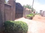 A picture of Quick sale 18 5m Plot located garuga on entebbe rd