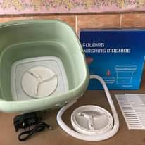 A picture of  Foldable mini washing machine 220000Uganda shillings Portable washer dryer