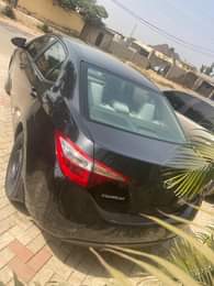 A picture of LOOKING FIR BELGIUM COROLLA SHARP AND CLEAN THEN LOOK NO
