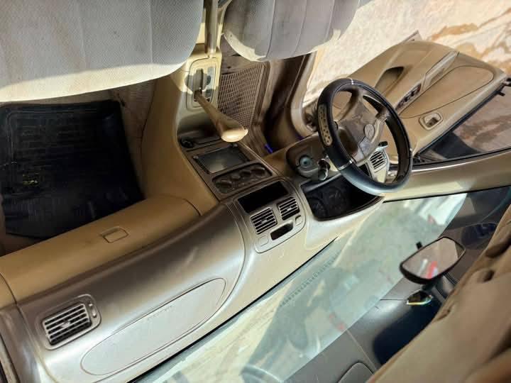 A picture of Faded First body Toyota Corolla small but mighty just for