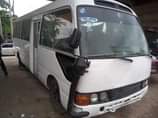 A picture of 2007 Toyota Coaster bus painted Sound engine and gear but