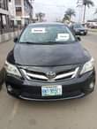 A picture of 5 months used 2011 Toyota corolla car is Sharp with