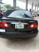 A picture of Corolla LE 2003 model with untempered engine going for 2