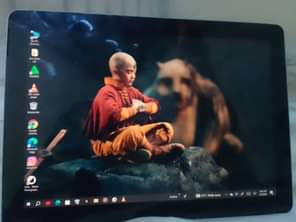 A picture of Microsoft surface pro with slight invisible crack has 4gbram 64gb