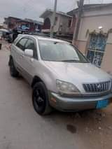 A picture of 2004 Black and red interior Lexus RX 300 Sliver color