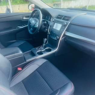 A picture of A fairly used car with a sound engine and gear