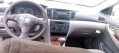 A picture of Toyota Corolla 2004 Engine Gear Ac needs attention Interior is
